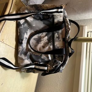 Tumi Voyager Mauren Camo Floral.  The shoulder strap is not Tumi, but is cute!
